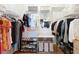 Large walk-in closet with ample shelving and storage at 8318 Quimby Cir, Davenport, FL 33896