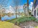 Backyard oasis with lake access and lush vegetation at 8318 Quimby Cir, Davenport, FL 33896