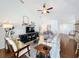 Spacious living room with vaulted ceiling and hardwood floors at 8318 Quimby Cir, Davenport, FL 33896