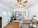 Bright home office with built-in shelving and desk at 8318 Quimby Cir, Davenport, FL 33896