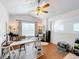 Home office with a desk, chair, and large window at 8318 Quimby Cir, Davenport, FL 33896