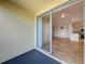 Private balcony with view of living area and sliding glass doors at 8803 Dunes Ct # 306, Kissimmee, FL 34747