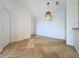 Dining area with tile floors and modern light fixture at 8803 Dunes Ct # 306, Kissimmee, FL 34747