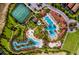 Aerial view of resort-style pool, lazy river, tennis courts at 5192 Oakbourne Ave, Davenport, FL 33837