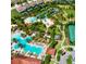 Aerial view of community pool and surrounding homes at 5192 Oakbourne Ave, Davenport, FL 33837