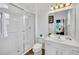 Bathroom with white vanity, toilet and shower at 5192 Oakbourne Ave, Davenport, FL 33837