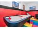 Game room featuring an air hockey table at 5192 Oakbourne Ave, Davenport, FL 33837