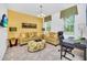 Home office with two couches, a coffee table, and a desk at 5192 Oakbourne Ave, Davenport, FL 33837