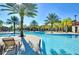 Expansive resort-style pool with lounge chairs at 5192 Oakbourne Ave, Davenport, FL 33837