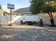 Spacious backyard with brick paver patio, basketball hoop, and fire pit area, great for outdoor fun at 12212 Holly Jane Ct, Orlando, FL 32824