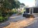 Spacious backyard patio with pavers and lush landscaping at 12212 Holly Jane Ct, Orlando, FL 32824