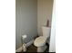 Clean bathroom with toilet and flooring at 12212 Holly Jane Ct, Orlando, FL 32824