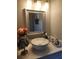 Modern bathroom with a vessel sink and updated vanity at 12212 Holly Jane Ct, Orlando, FL 32824