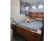 Bedroom with laminate wood flooring and wooden furniture at 12212 Holly Jane Ct, Orlando, FL 32824