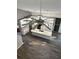 Aerial view of a modern kitchen with a large island, stainless appliances, and white cabinets at 12212 Holly Jane Ct, Orlando, FL 32824