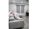 Cozy living room with modern furniture and grey color scheme at 12212 Holly Jane Ct, Orlando, FL 32824