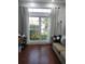 Bright office space with hardwood floors and a large window at 12212 Holly Jane Ct, Orlando, FL 32824