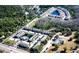 Aerial view of community with lake, pool, and townhouses at 10583 Regent Square Dr # 1206, Orlando, FL 32825