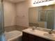 Bathroom boasts double sinks and a relaxing garden tub at 10583 Regent Square Dr # 1206, Orlando, FL 32825