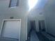 Inviting two-story townhouse featuring a single-car garage and muted color scheme at 10583 Regent Square Dr # 1206, Orlando, FL 32825