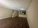 Spacious living room with modern flooring and an open kitchen at 10583 Regent Square Dr # 1206, Orlando, FL 32825