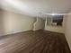 Open-concept living room with modern hard flooring and natural light at 10583 Regent Square Dr # 1206, Orlando, FL 32825