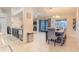 Bright dining area with a dark wood table and gray chairs at 1188 Anne Elisa Cir, St Cloud, FL 34772