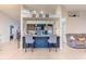 Modern kitchen with dark cabinets and a breakfast bar at 1188 Anne Elisa Cir, St Cloud, FL 34772