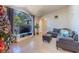 Spacious living room with a large TV and comfortable seating at 1188 Anne Elisa Cir, St Cloud, FL 34772