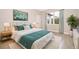 Bright bedroom with a queen bed and ample natural light at 13142 Sw 43Rd Avenue Rd, Ocala, FL 34473