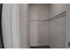 An empty closet space with a wire shelf offers practical storage solutions at 1321 Congo Dr, Kissimmee, FL 34759