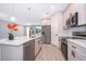 Modern kitchen featuring stainless steel appliances and an island at 15321 Sw 43Rd Avenue Rd, Ocala, FL 34473