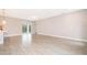 Bright and airy living room with tile floors and sliding glass doors at 15321 Sw 43Rd Avenue Rd, Ocala, FL 34473