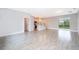 Open living space with tile floors and access to the backyard at 15321 Sw 43Rd Avenue Rd, Ocala, FL 34473