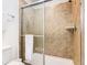 Clean bathroom with shower and tiled walls at 1610 Lima Ave, Kissimmee, FL 34747