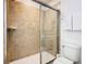 Clean bathroom with shower and tile surround at 1610 Lima Ave, Kissimmee, FL 34747