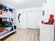 ' bedroom with bunk beds and Marvel-themed decor at 1610 Lima Ave, Kissimmee, FL 34747