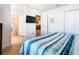 Bedroom with view into living room and bathroom at 1610 Lima Ave, Kissimmee, FL 34747
