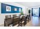 Bright dining room with a large table and seating for many at 1610 Lima Ave, Kissimmee, FL 34747