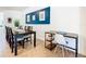 Dining room with a large table and blue accent wall at 1610 Lima Ave, Kissimmee, FL 34747