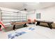 Game room with pool table, air hockey, and seating area at 1610 Lima Ave, Kissimmee, FL 34747