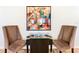 Game room with retro arcade game and comfortable seating at 1610 Lima Ave, Kissimmee, FL 34747