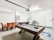 Game room with pool table, air hockey, and barstools at 1610 Lima Ave, Kissimmee, FL 34747
