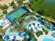 Peaceful lazy river winding through lush landscaping at 1610 Lima Ave, Kissimmee, FL 34747