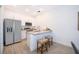 Modern kitchen with stainless steel appliances and granite countertops at 1813 Coriander Dr, Kissimmee, FL 34759
