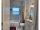 Updated bathroom with a bathtub and marble tile at 19 James Ct, Davenport, FL 33837