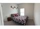 Bedroom with a double bed and gray carpet at 19 James Ct, Davenport, FL 33837
