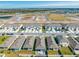 An aerial view of a residential neighborhood, highlighting a single-Gathering home at 2265 Tay Wes Dr, St Cloud, FL 34771