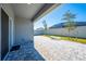 Covered patio and grassy backyard at 2265 Tay Wes Dr, St Cloud, FL 34771