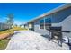 Backyard with patio, grill, and fenced yard at 2265 Tay Wes Dr, St Cloud, FL 34771